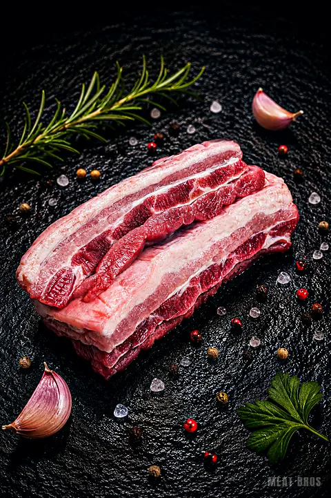 Asado de tira de res, costilla cortada en tira con buena carne